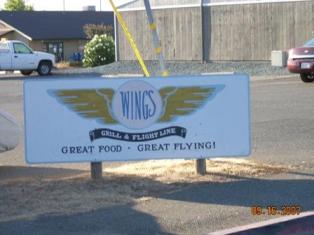 Wings Restarurant Sign