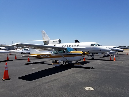 The mighty C172 parked between private jets at SNA.