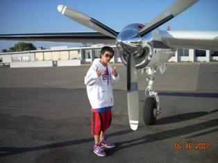 Josh in front of a twin turborpop.