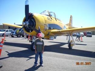 Tim with a Vintage WWII airplane.